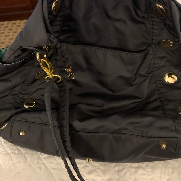 Best Black Tote Crossbody Bag With Gold Appliqué - Picture 11 of 11